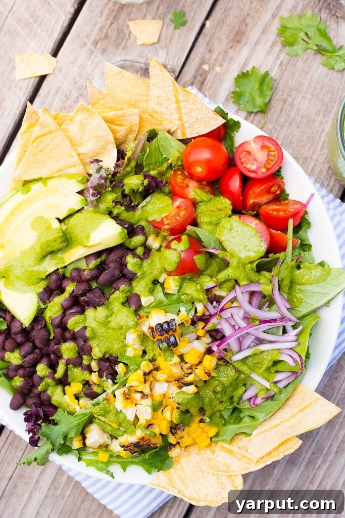 Summer Taco Salad Bowls, a refreshing and customizable meal perfect for warm weather, with crisp lettuce and colorful veggies.
