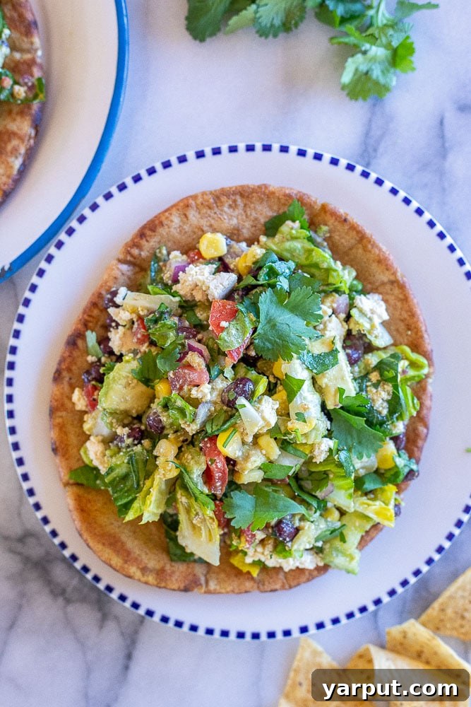 Mexican Chopped Salad Pitas, a fresh and easy way to enjoy a vibrant salad in a portable pita, filled with colorful vegetables.