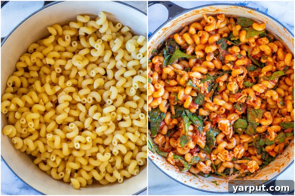 Creamy Spinach Feta Pasta Bake 3 Step-by-step image showing how to combine cooked pasta with fresh spinach, sauce, and cheeses in a large mixing bowl before transferring to a baking dish.