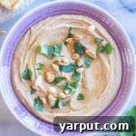A small image of the Peanut Butter Hummus, indicating the main recipe photo.