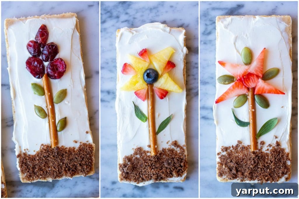 Blooming Graham Gardens 5 A close-up image showing a variety of flower garden graham crackers, each uniquely decorated with colorful fruits and nuts.