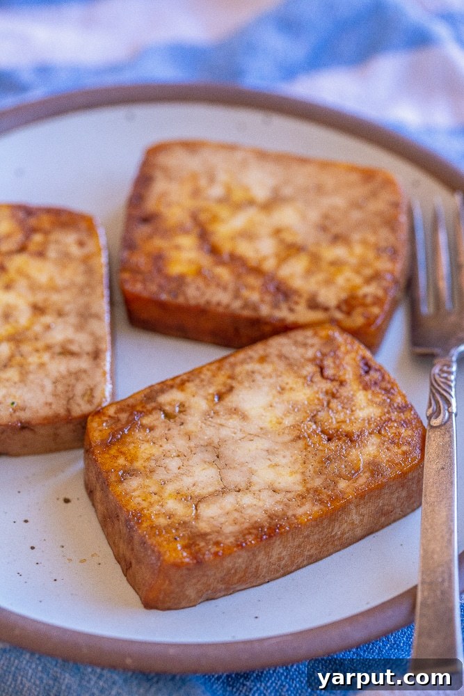 67 Beginner-Friendly Vegan Recipes 3 Crispy golden-brown fried tofu cubes, perfectly seasoned and ready to be added to any meal. A simple and delicious vegan protein for beginners.