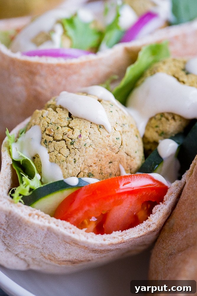 67 Beginner-Friendly Vegan Recipes 67 Golden-brown and perfectly crispy easy homemade falafel balls, garnished with fresh parsley, ready to be served in pitas or salads.