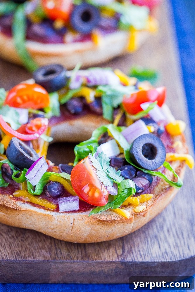 67 Beginner-Friendly Vegan Recipes 24 Creative and fun taco pizza bagels, topped with a flavorful taco seasoned base, vegan cheese, and fresh cilantro for a quick meal.