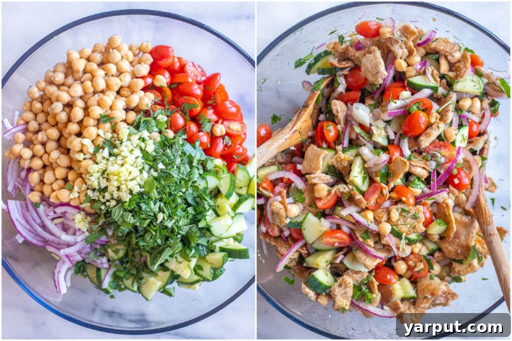 Golden Pita Salad 4 A bowl of Crispy Pita Bread Salad with all ingredients mixed, showing the fresh vibrant colors and textures ready to be served.