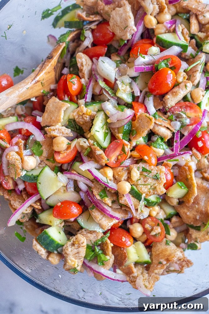 41 Vibrant Summer Salad Ideas 3 Crispy Pita Bread Salad with fresh vegetables and herbs.