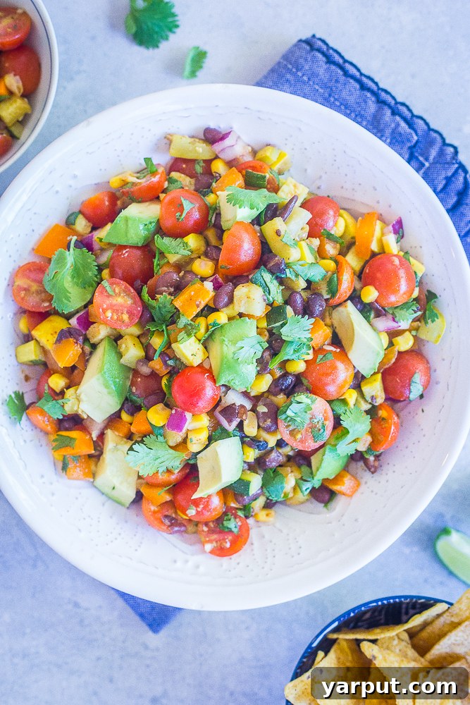 41 Vibrant Summer Salad Ideas 25 Loaded Summer Vegetable Salad with Black Beans, a filling meal.