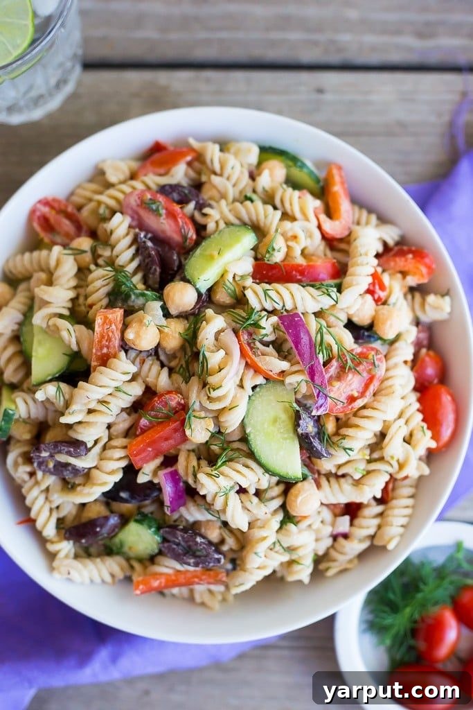 41 Vibrant Summer Salad Ideas 37 Creamy Tahini Greek Pasta Salad, a delicious and hearty option.