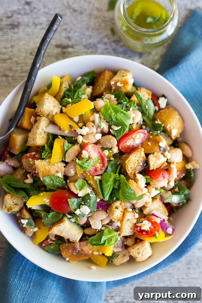 41 Vibrant Summer Salad Ideas 38 Spinach and White Bean Panzanella Salad with Basil, a fresh twist.