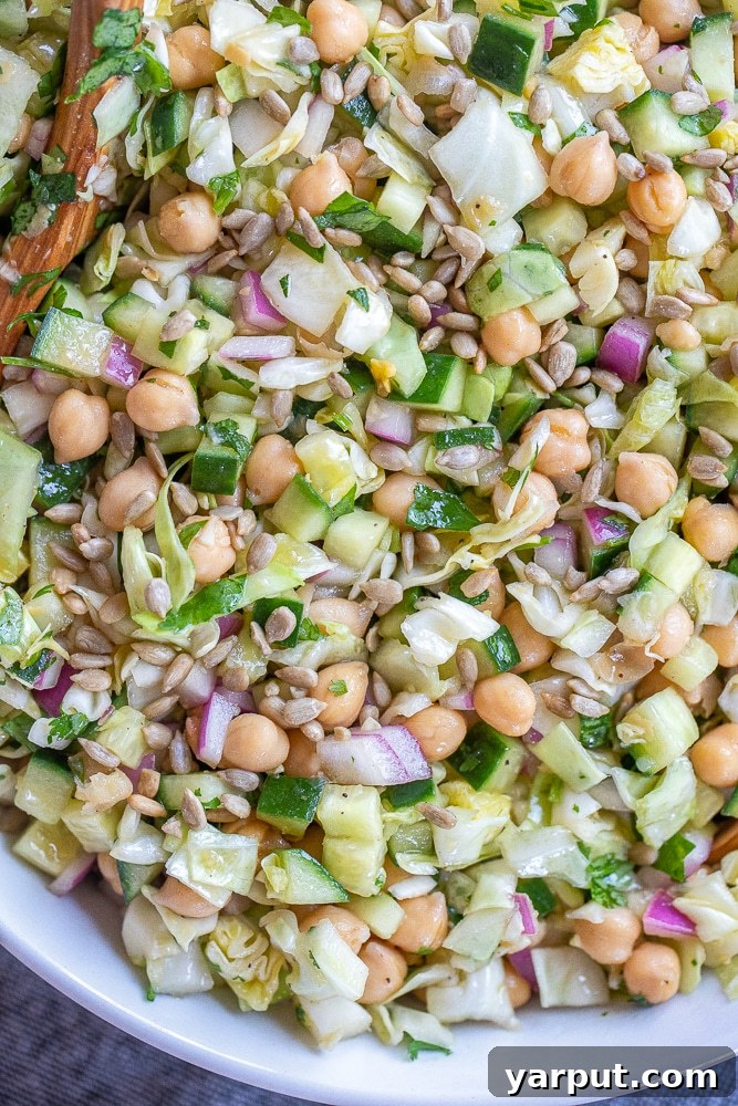 41 Vibrant Summer Salad Ideas 8 Chickpea Salad with Cucumber and Cabbage, a protein-rich dish.