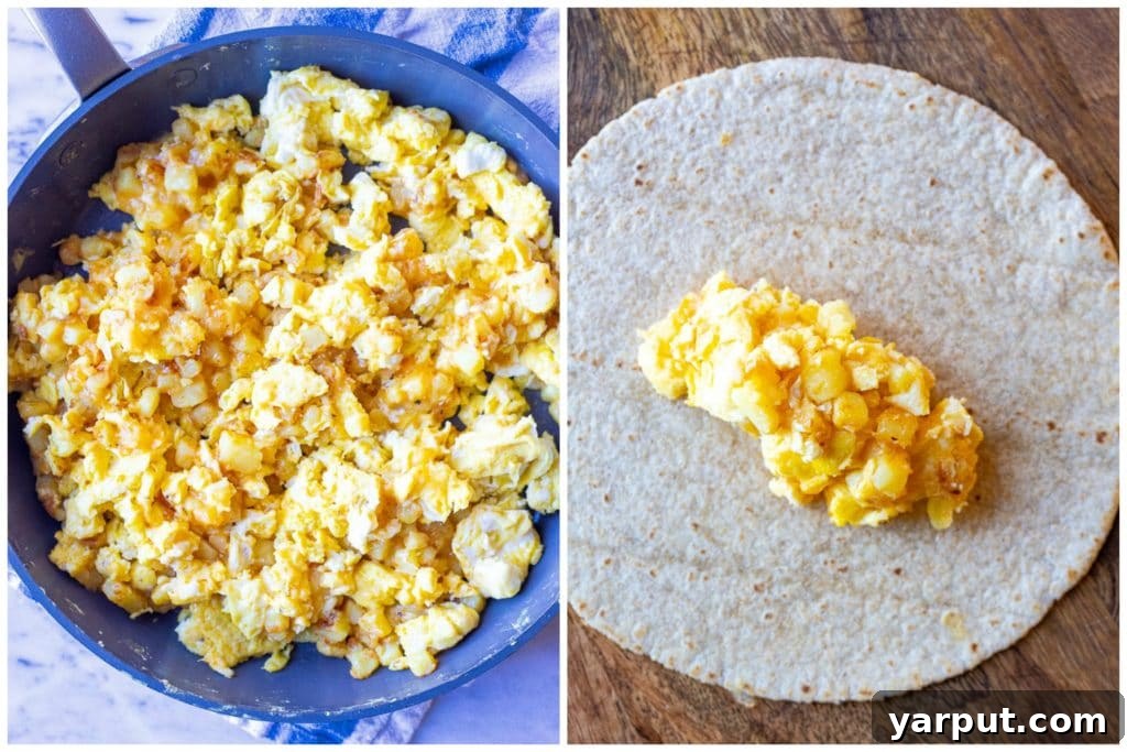 Delicious potato, egg, and cheese filling being prepared in a pan next to warm tortillas, ready for assembly into breakfast burritos.