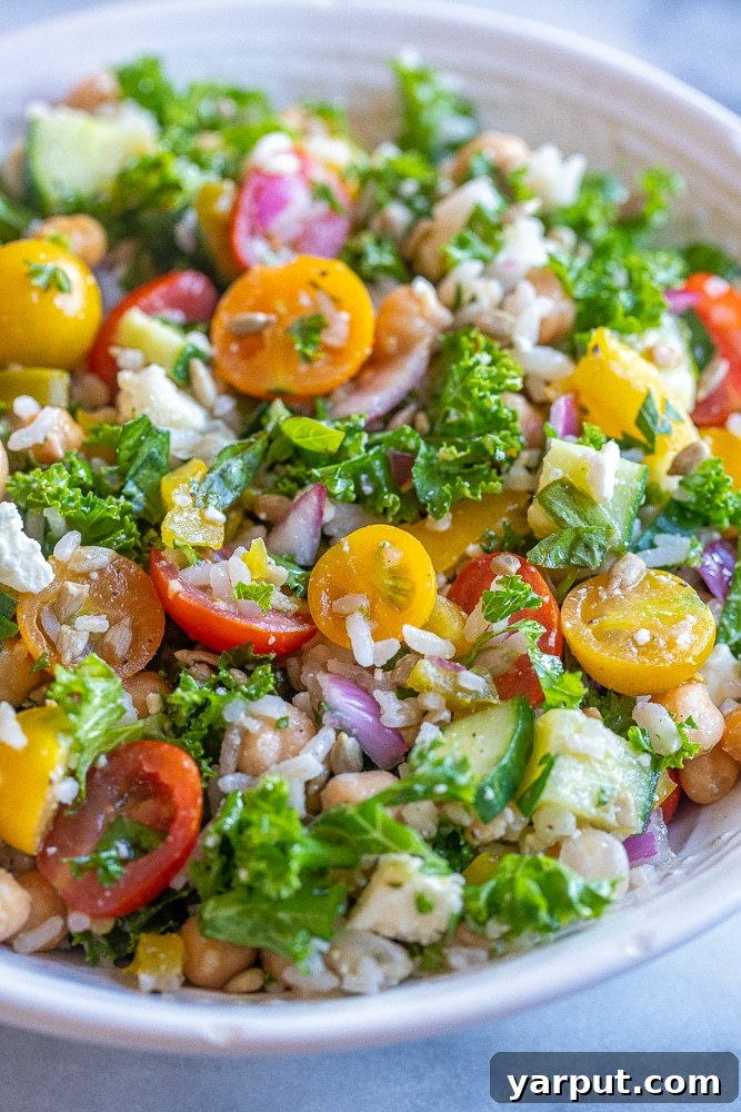 Hearty Chickpea & Kale Rice Bowl 5 A close-up view of the finished Rice Salad with Chickpeas and Kale, highlighting its fresh textures and vibrant colors.