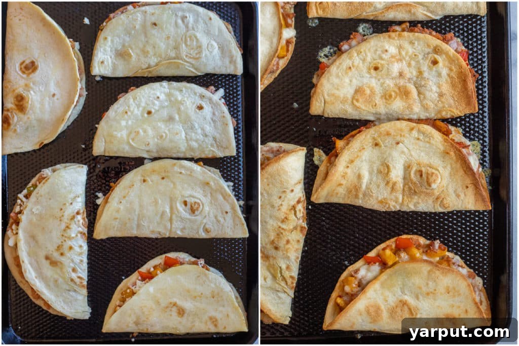 Delicious Oven-Baked Vegetarian Tacos 4 Baked Vegetarian Tacos arranged on a sheet pan, golden-brown and crispy from the oven, ready to be served