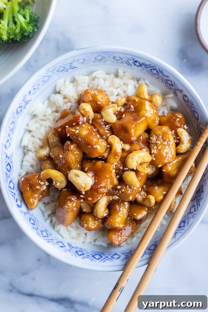 Sweet & Sticky Ginger Cashew Tofu 2 bowl of sticky ginger cashew tofu with rice and vegetables