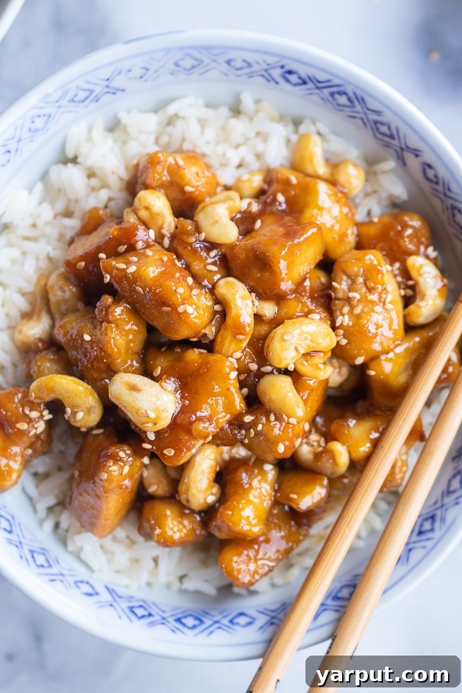 Sweet & Sticky Ginger Cashew Tofu 4 close up of ginger cashew tofu with rice
