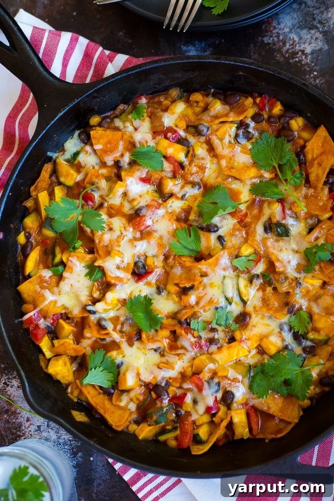 Effortless Vegetarian Meals for Week Two 4 One pot stove top enchiladas, bubbling with cheese and sauce.