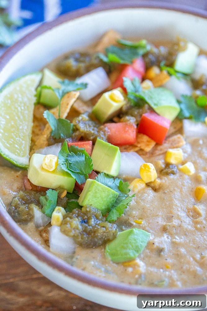 Velvety Plant-Based White Bean Chili 6 close up of a bowl of creamy white bean chili