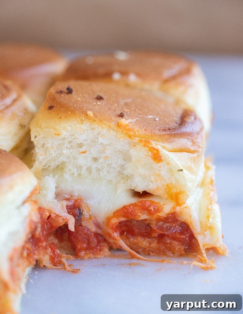 close up of a chicken parmesan vegetarian slider