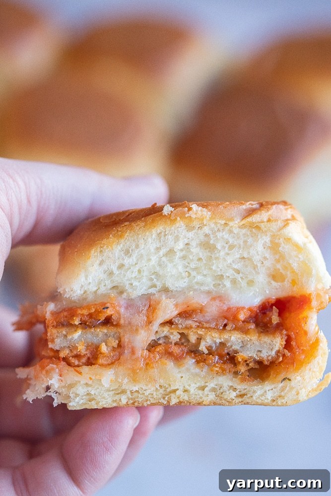 Simplify Your Week 5 Meals 7 A platter of vegetarian Chick'n Parmesan sliders, garnished with fresh basil, ready for a Friday night meal.