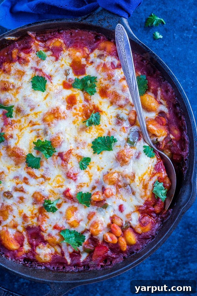 Effortless Week 6 Meal Planning 6 A bubbly and cheesy 30 Minute Gnocchi Pizza Bake, a creative and quick vegetarian dinner.