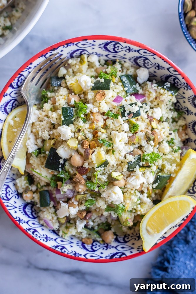 A refreshing Lemon Zucchini Couscous Salad in a bowl, featuring fluffy couscous, fresh zucchini, and a zesty dressing.