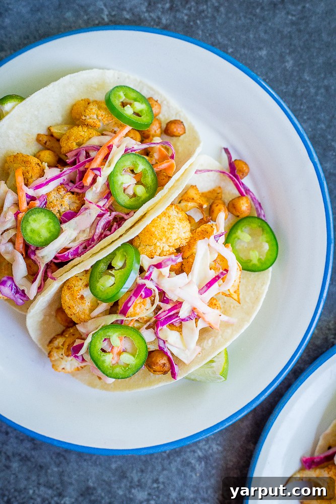 Unleash the Flavor: 21 Irresistible Veggie Tacos 22 BBQ Cauliflower and Chickpea Tacos with a creamy lime slaw