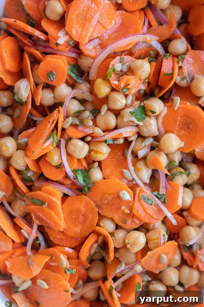 Maple Orange Glazed Carrot & Chickpea Medley 6 close up of fresh carrot salad with chickpeas recipe