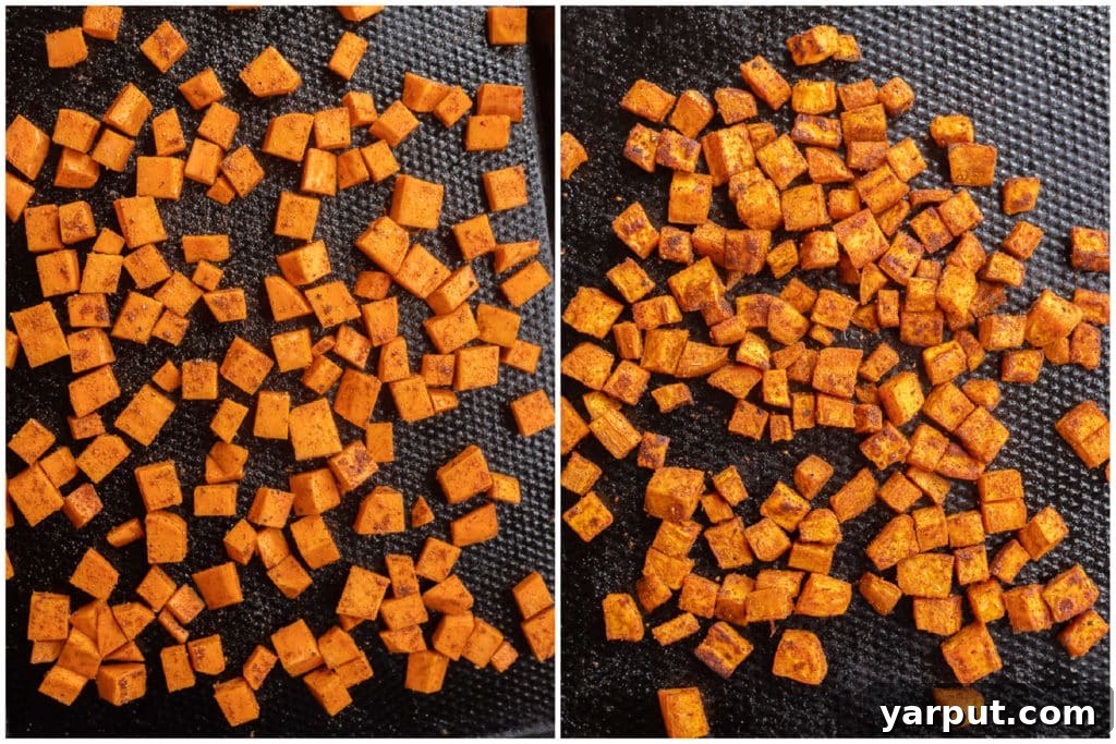 Roasted Sweet Potato and Black Bean Power Bowls 3 Close-up of sweet potato cubes tossed with a medley of aromatic spices on a baking sheet, ready for roasting.