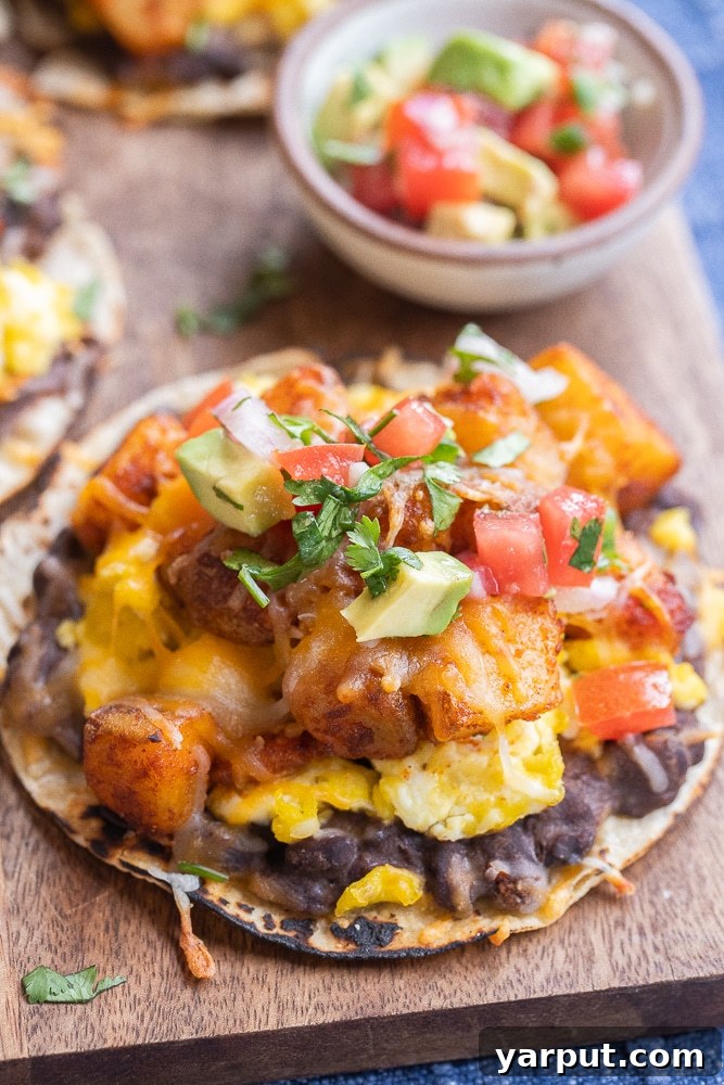 close up of a potato egg and cheese breakfast taco with pico de Gallo