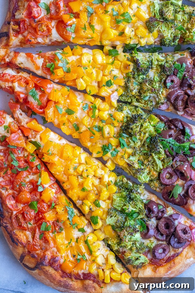 Thrifty & Tasty: Week 16 Vegetarian Meal Guide 7 Vibrant Rainbow Vegetable Pizza with various colorful toppings
