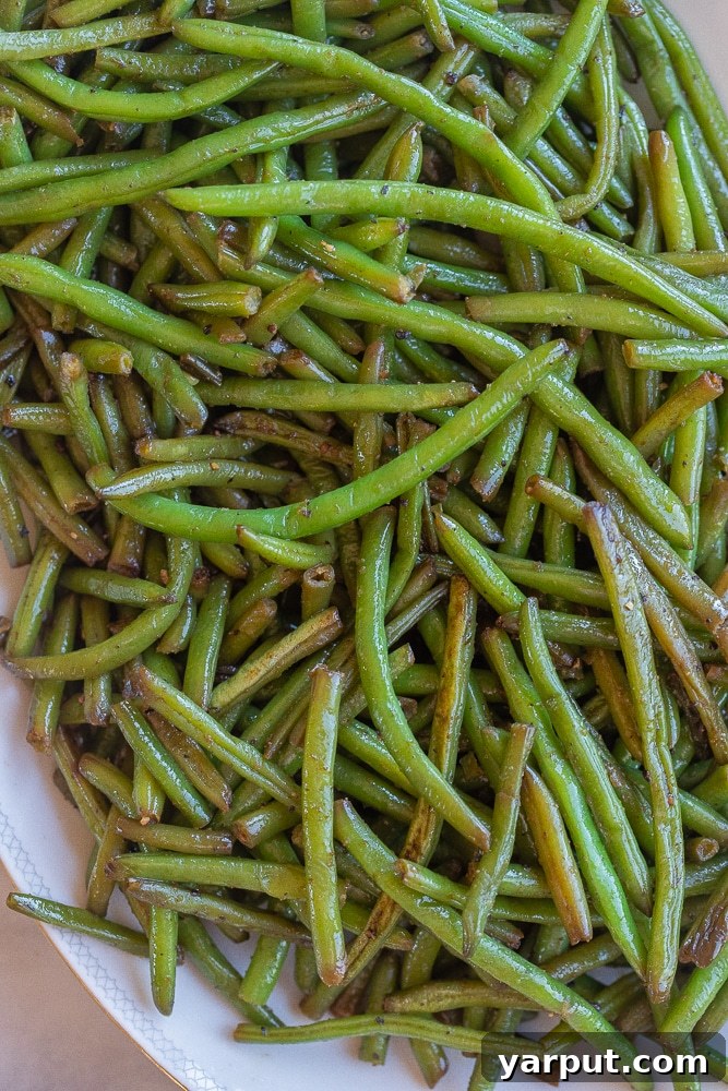 Effortless Green Bean Perfection 2 the best easy green beans on a platter