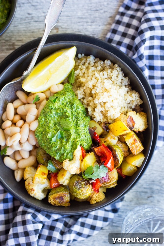Affordable Vegetarian Eats: Week 17 Menu 4 Colorful Roasted Veggie Buddha Bowl with a drizzle of pesto