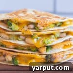 Broccoli Cheddar White Bean Quesadillas in a recipe card thumbnail
