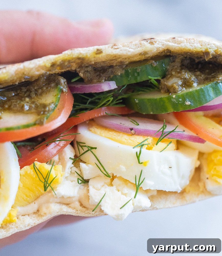 Veggie Morning Pockets 6 close up of a vegetarian breakfast pita with fresh herbs