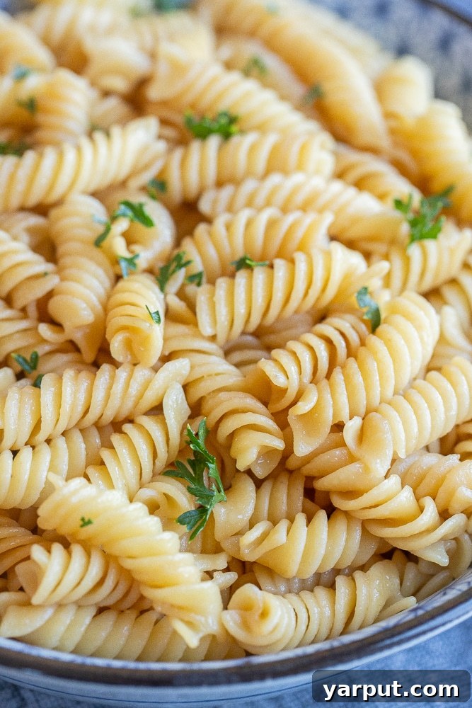 Effortless Butter Noodles Kids Adore 6 close up of butter soy noodles in a bowl