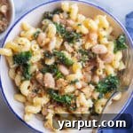 Cozy Kale and White Bean Pasta with Parmesan recipe card image