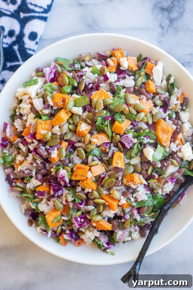 Spooky Rice and Veggie Medley 6 halloween colored veggie salad in a large serving bowl ready to be enjoyed