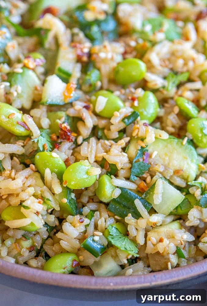 Refreshing Cucumber Edamame Rice Salad 7 close up of edamame and rice salad with garlic ginger dressing