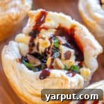Goat Cheese Beet and Balsamic Puff Pastry Appetizers recipe image.
