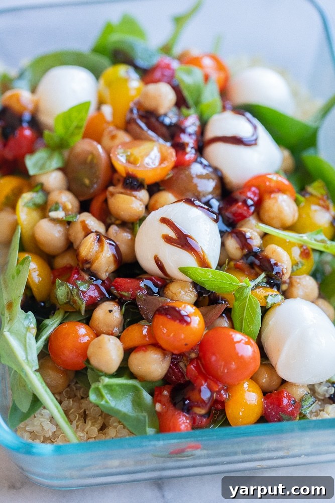 Caprese Quinoa Power Bowls 6 Close-up of a mozzarella ball within the Caprese Quinoa Salad Lunch Bowls, highlighting the creamy texture.