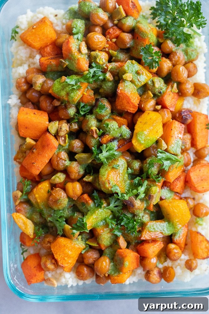 Caramelized Carrot Couscous Bowls with Zesty Tahini Drizzle 6 A perfectly portioned roasted carrot and couscous salad, neatly arranged in a clear meal prep container, ready to be enjoyed with the vibrant lemon parsley tahini dressing.