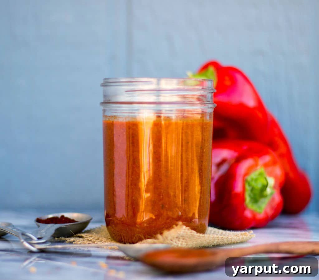 Homemade Gluten Free Vegan Roasted Red Pepper Enchilada Sauce 11 Close-up of a delicious plate of enchiladas topped with roasted red pepper sauce