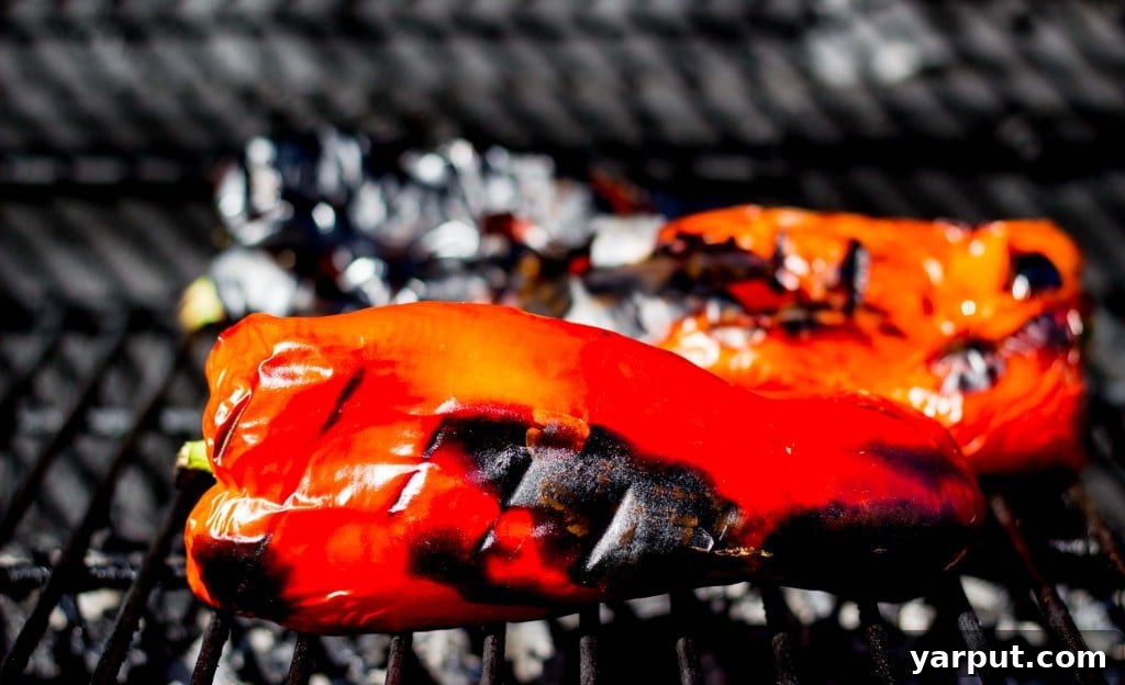 Homemade Gluten Free Vegan Roasted Red Pepper Enchilada Sauce 5 Roasted red bell peppers on a grill, charring beautifully