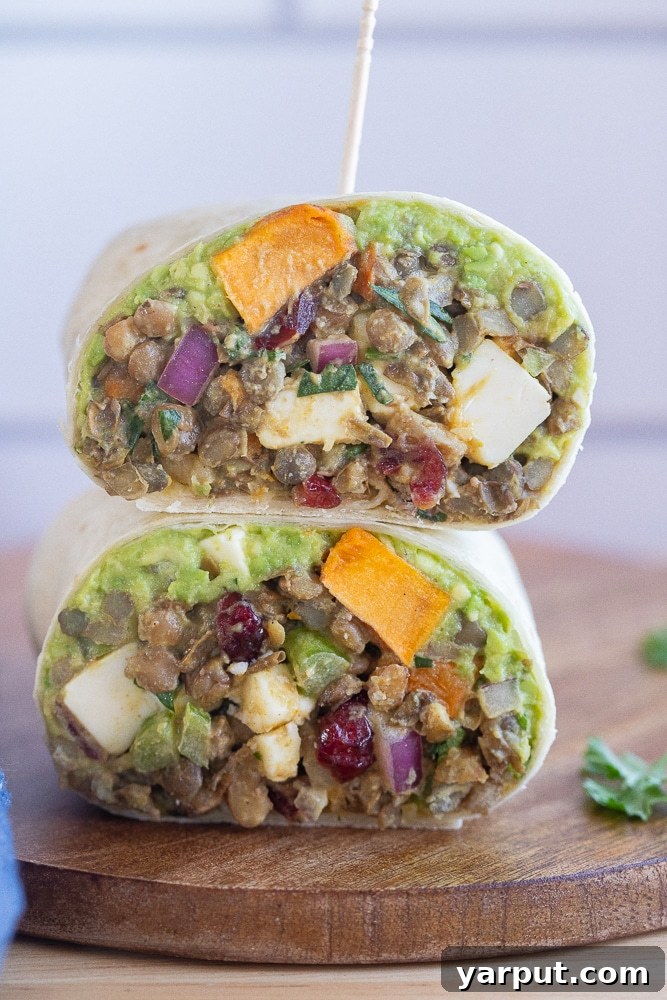Golden Sweet Potato and Curried Lentil Wraps 6 vegetarian lentil wrap cut in half and stacked on a cutting board