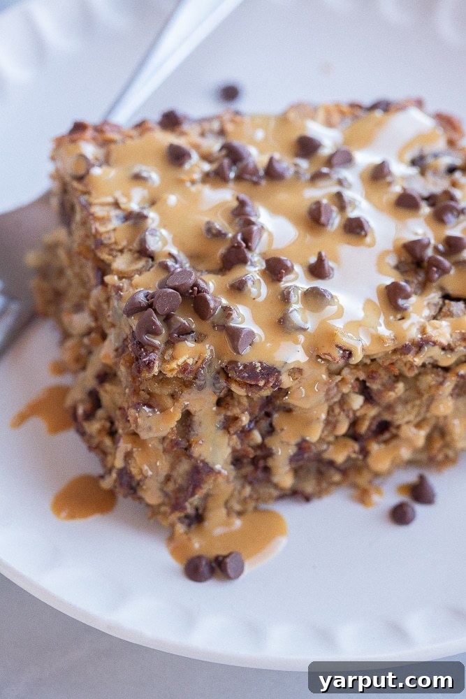 Protein-Packed Baked Oats 6 a delicious close-up of a slice of peanut butter banana baked oatmeal, showcasing its texture