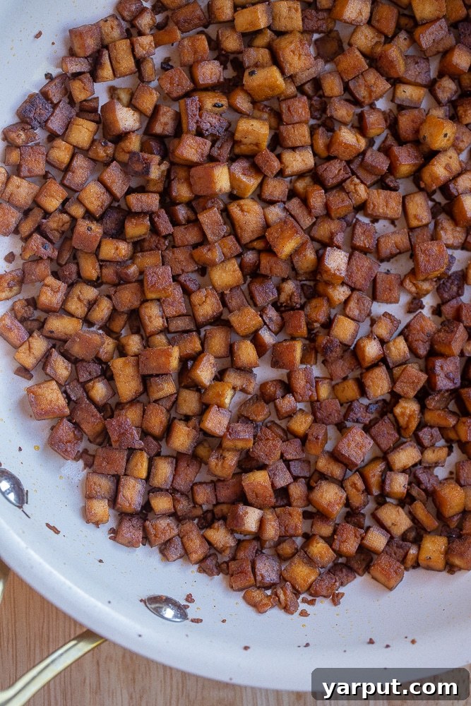 Ultimate Crispy Vegan Pancetta 6 crispy tofu pancetta in a frying pan