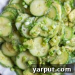 Close up of a bowl of homemade avocado cucumber salad