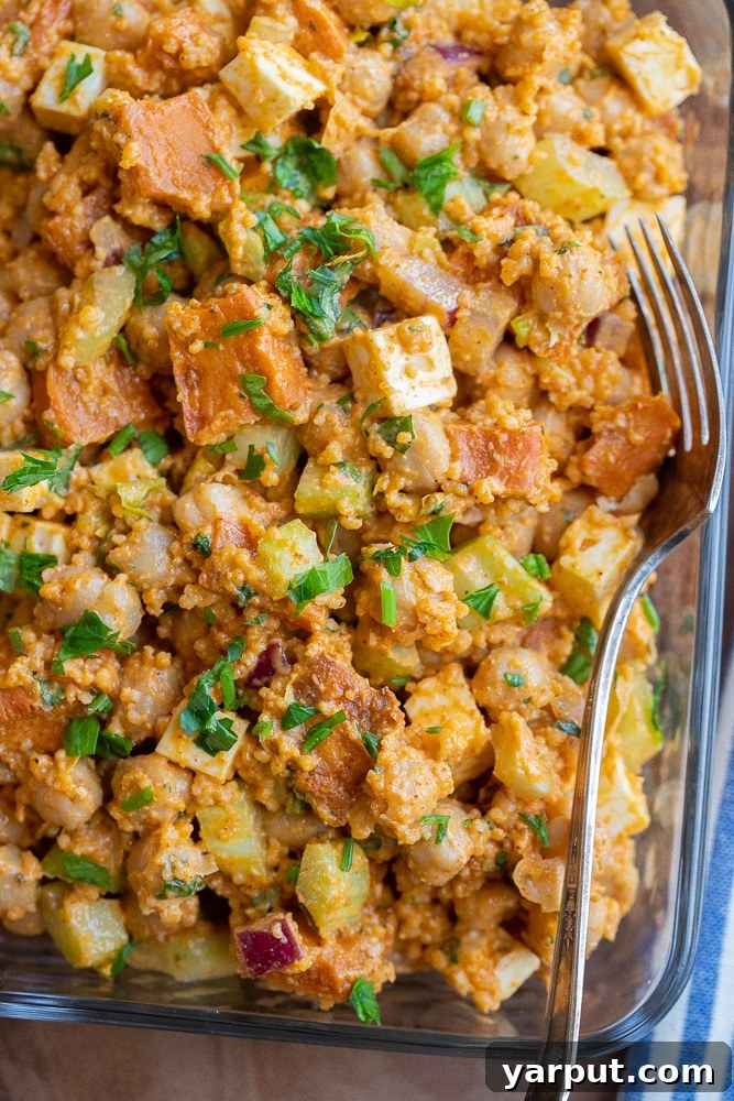 Spicy Buffalo Sweet Potato & Chickpea Power Bowls 7 A close-up shot highlighting the texture of the buffalo sweet potato chickpea salad with feta and couscous.