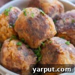 A dish of easy vegetarian meatballs, crispy and golden-brown, served fresh.