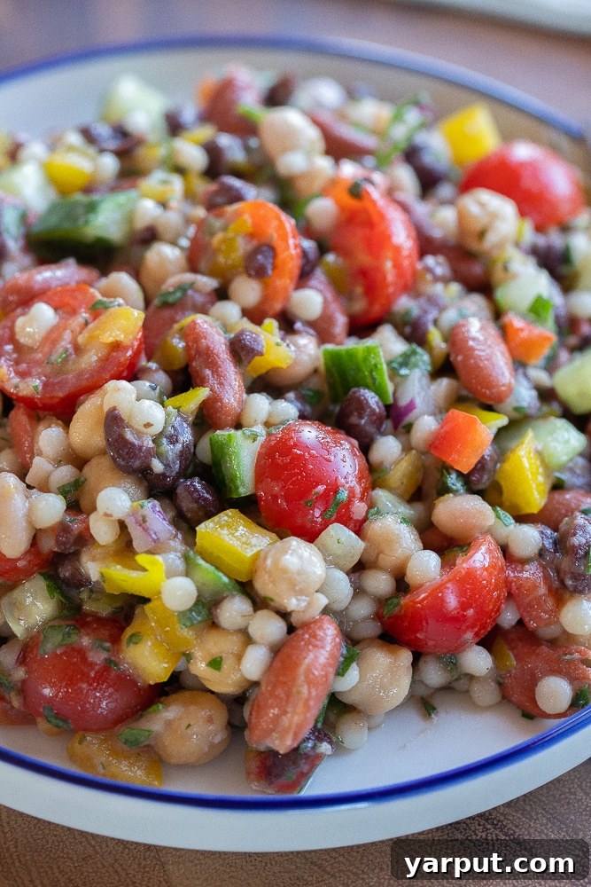 Mediterranean Pearl Couscous with Four Beans 2 plate full of four bean couscous salad